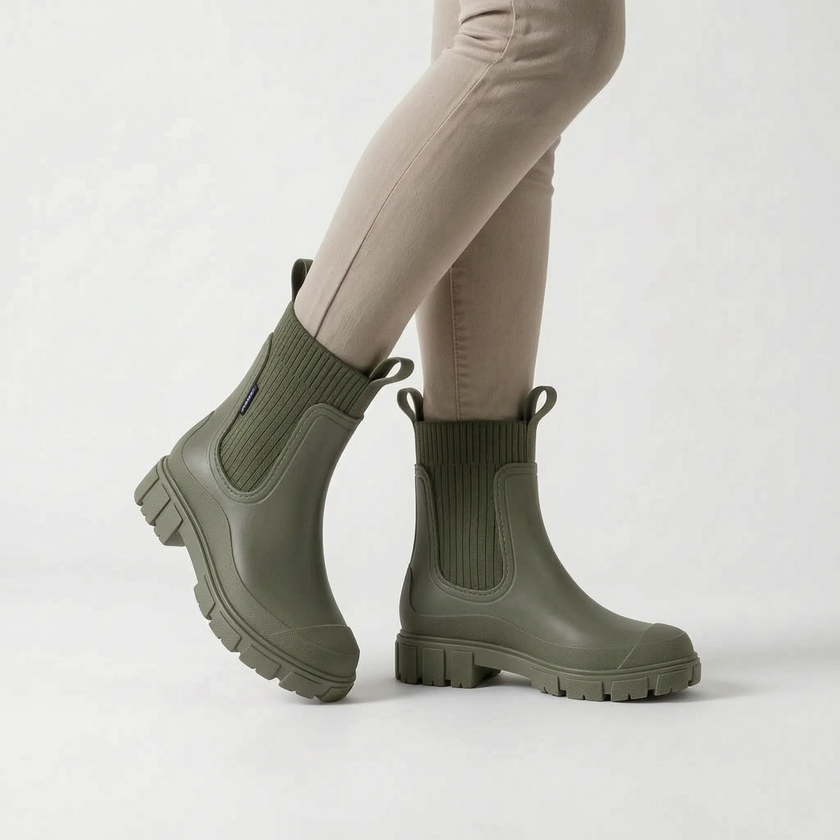 Women's ankle rain boots with ribbed shafts and chunky treaded soles