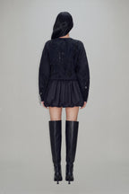 Women's black cropped blazer with V-neckline, long sleeves, embellishment and fringe trims