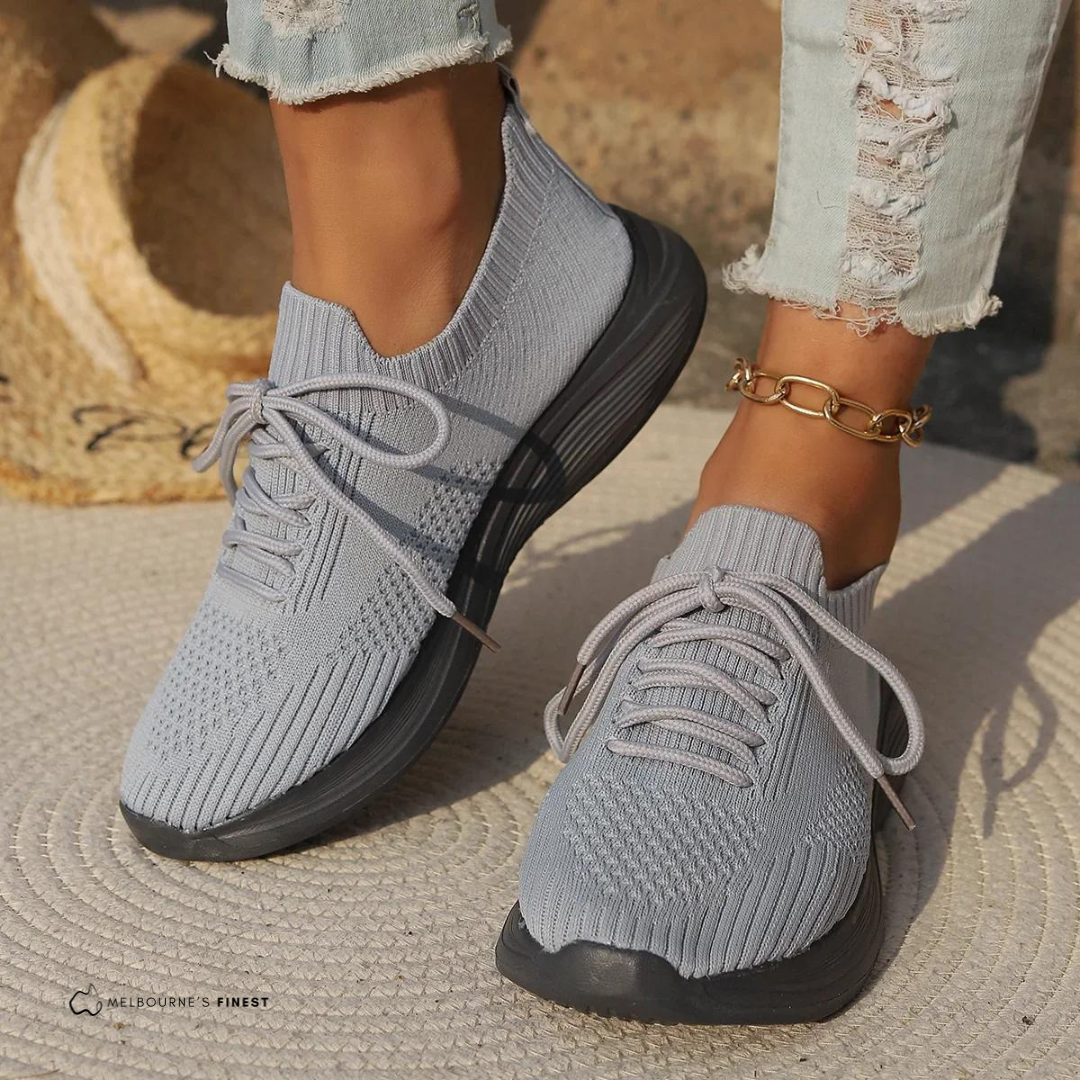 Women's knitted lace-up trainers with sock-style ankle and layered sole
