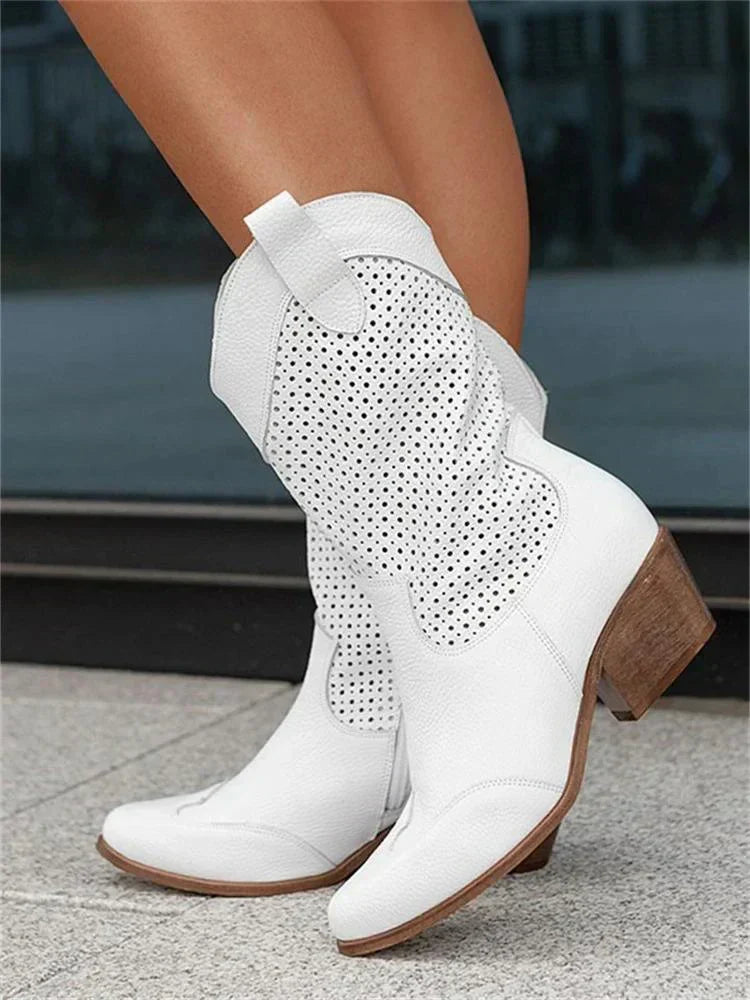 Perforated women's cowboy boots with almond toes and mid block heels