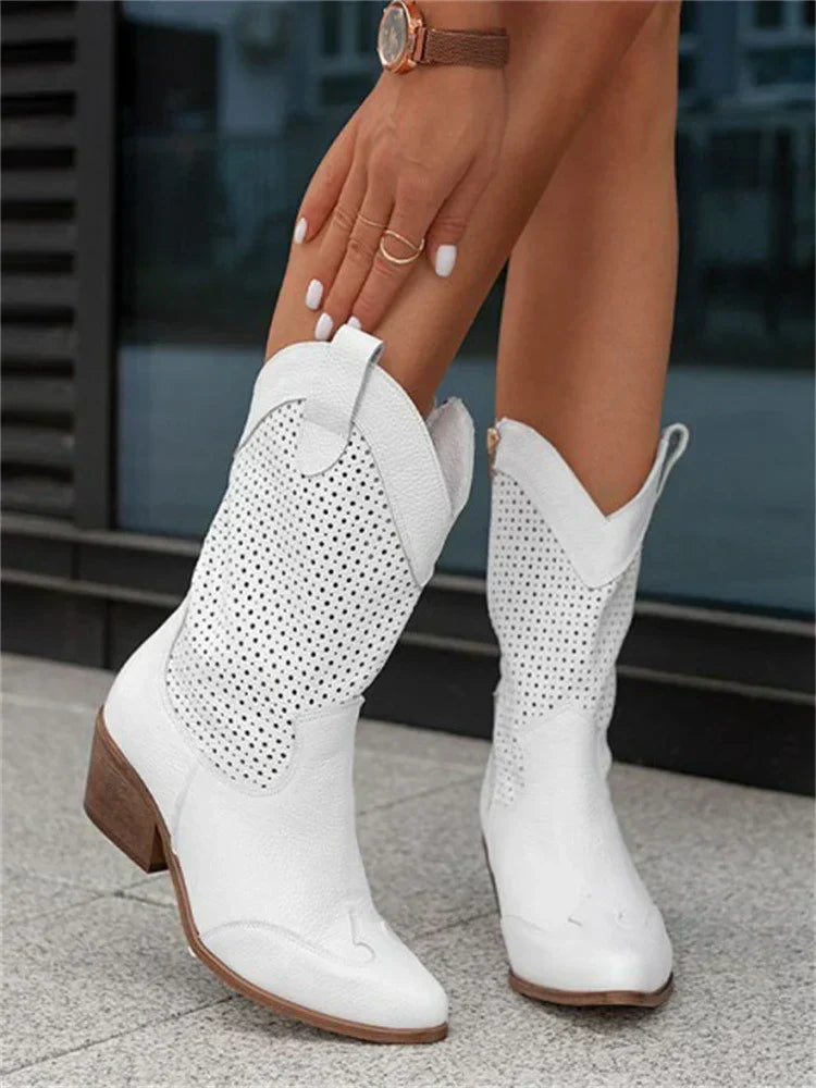 Perforated women's cowboy boots with almond toes and mid block heels
