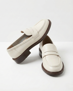 Women's slip-on loafers with penny straps, rounded toes and low heels