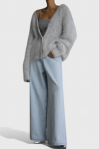 Women's relaxed V-neck button-front cardigan with long sleeves and ribbed trims