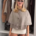 Women's khaki knitted cape cardigan with button front and ribbed trims