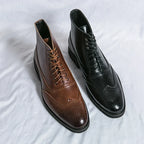 Men's ankle brogue boots with lace-up fronts, perforated detailing and low heels