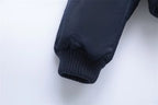 Women's navy cropped bomber jacket with ribbed collar and full zip