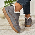Women's slip-on loafers with moc toe stitching, plush trim and flat textured soles