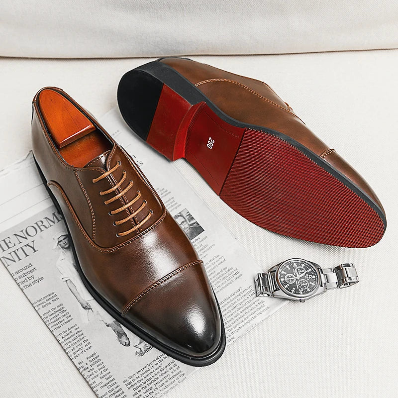 Men's cap toe Oxford shoes with lace-up fronts and contrasting soles