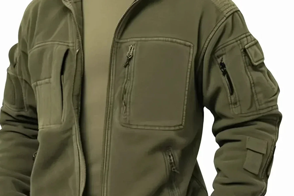 Men's green utility jacket with high collar, front zip and multiple pockets