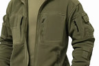 Men's green utility jacket with high collar, front zip and multiple pockets