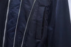 Women's navy cropped bomber jacket with ribbed collar and full zip