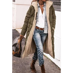 Women's long quilted hooded coat with contrasting textured trim and side pockets