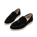 Women's slip-on loafers with penny strap and flat sole