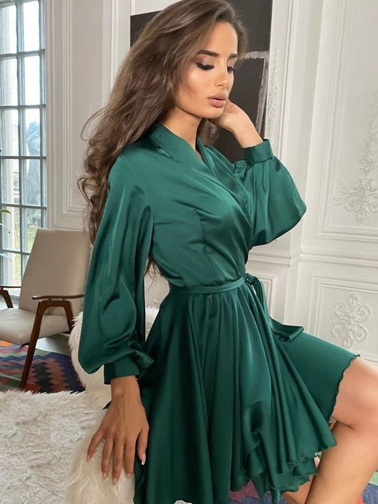 Women's long-sleeved wrap mini dress with a tie waist and flared skirt