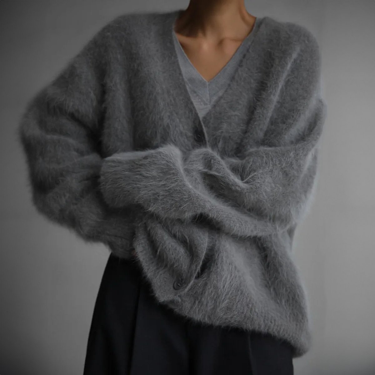 Women's textured knit cardigan with V-neckline, long sleeves and button front
