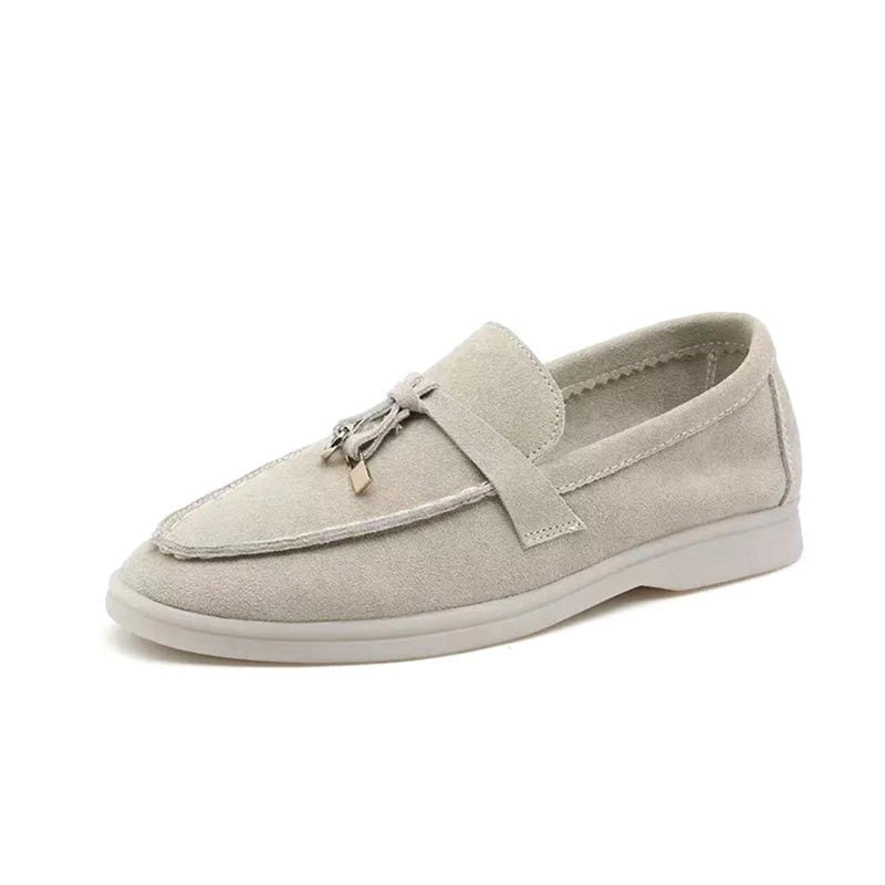 Women's slip-on loafers with penny strap and flat sole
