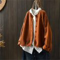Textured knit cardigan with button front, long sleeves and upper front pocket