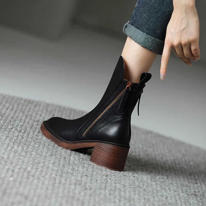 Women's ankle boots with side zips, almond toes and ribbed block heels
