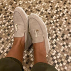 Women's slip-on loafers with penny strap and flat sole