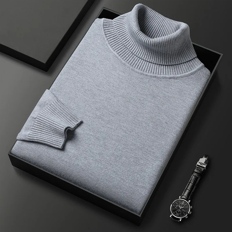 Men's plain ribbed turtleneck sweater folded in a presentation box