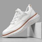 Textured lace-up trainers with round toe and layered flat sole