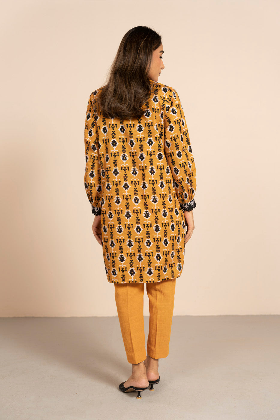 Women's mustard geometric tunic shirt with split neckline and long sleeves