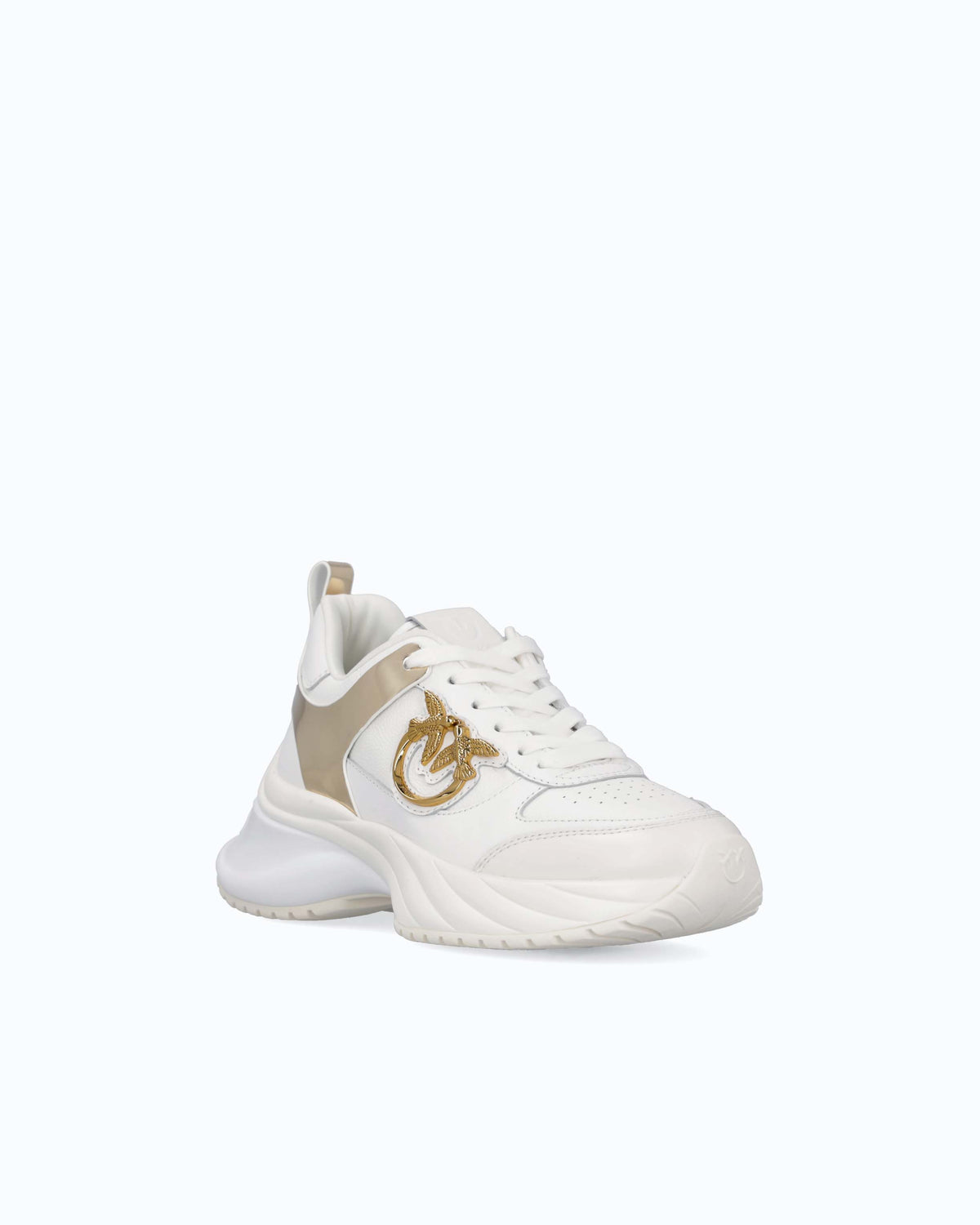 White women's trainers with gold mirror-effect side panels and chunky sole