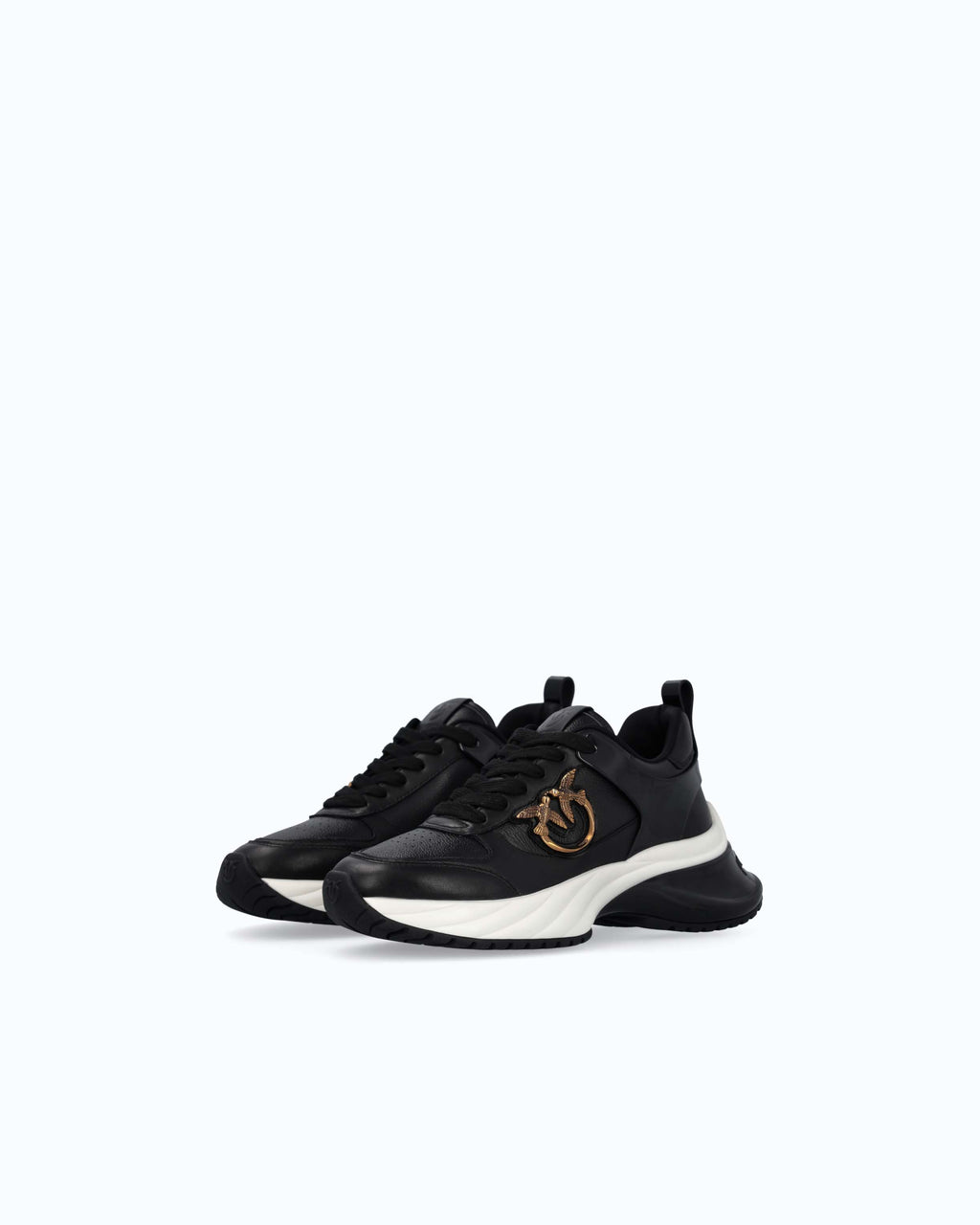 Black lace-up platform trainers with white sole and gold side emblem