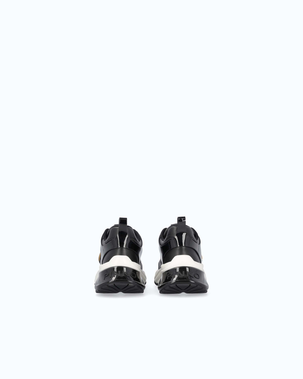 Black lace-up platform trainers with white sole and gold side emblem