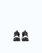 Black lace-up platform trainers with white sole and gold side emblem