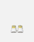 White perforated lace-up sneakers with yellow and grey details