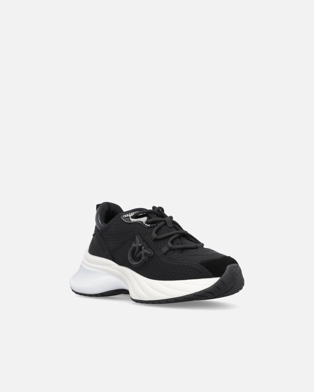 Black perforated trainers with lace-up fastening and white chunky sole