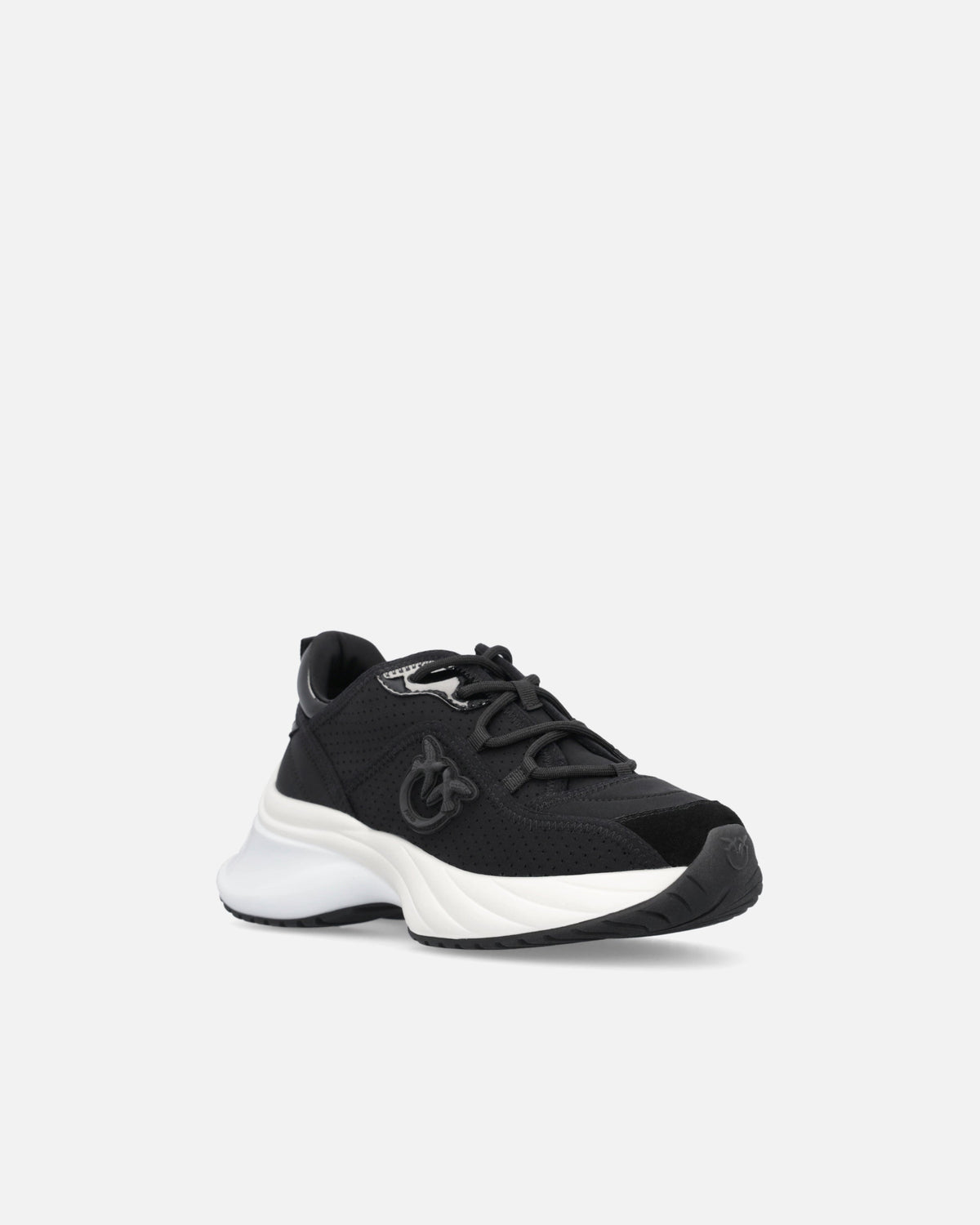 Black perforated trainers with lace-up fastening and white chunky sole
