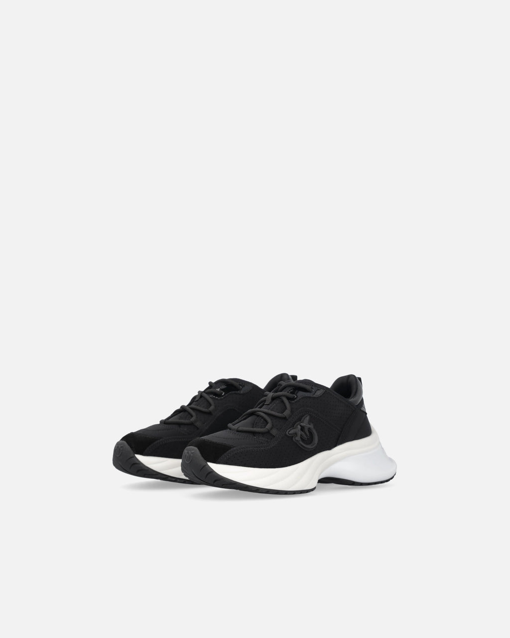 Black perforated trainers with lace-up fastening and white chunky sole