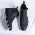 Men's Chelsea boots with elastic side panels, pull tabs and low heels