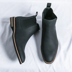 Men's Chelsea boots with elastic side panels, pull tabs and low heels