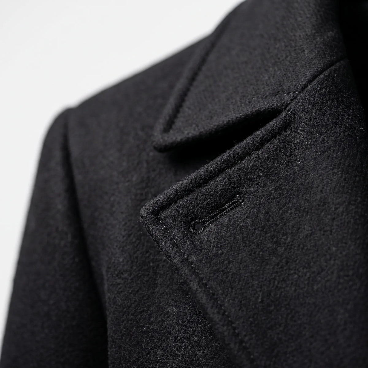 Men's long double-breasted coat with wide lapels and button front
