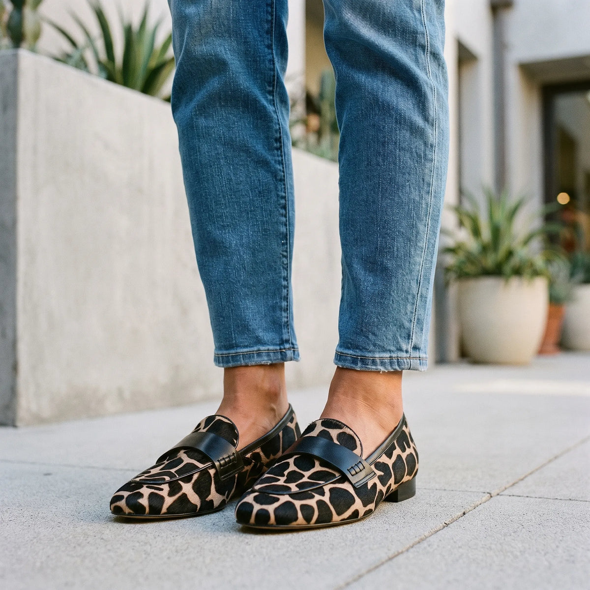 Women's animal print slip-on loafers with almond toes and low block heels