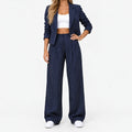 Women's pinstripe trouser suit with cropped blazer and wide-leg trousers