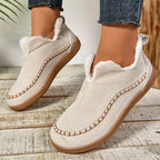 Women's slip-on loafers with moc toe stitching, plush trim and flat textured soles