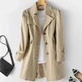 Women's long-sleeved trench coat with notched collar, button front and cuff tabs