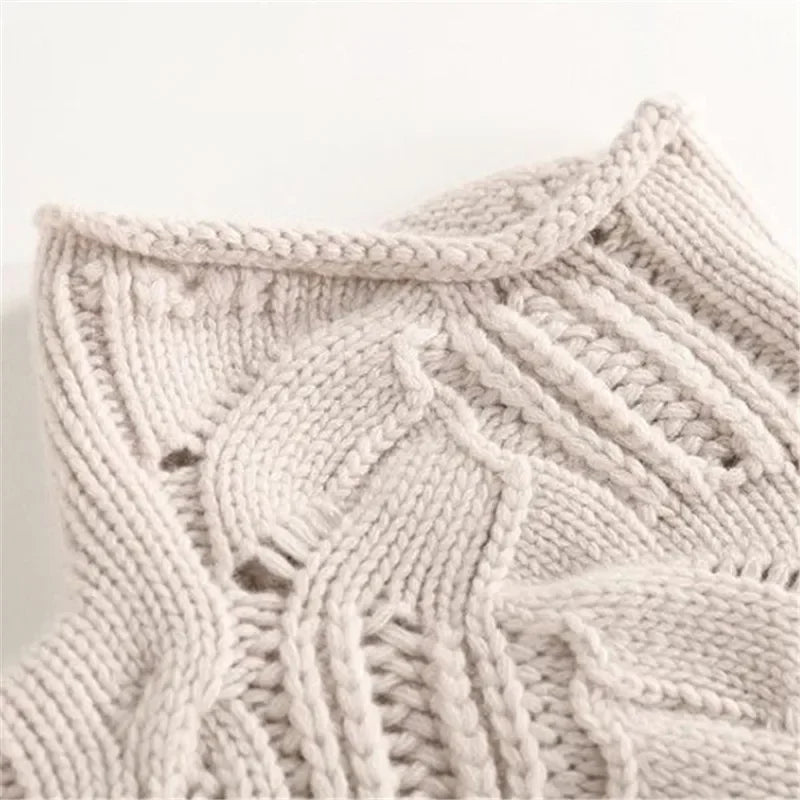 Women's textured knitted jumper with high turtle neck and long sleeves