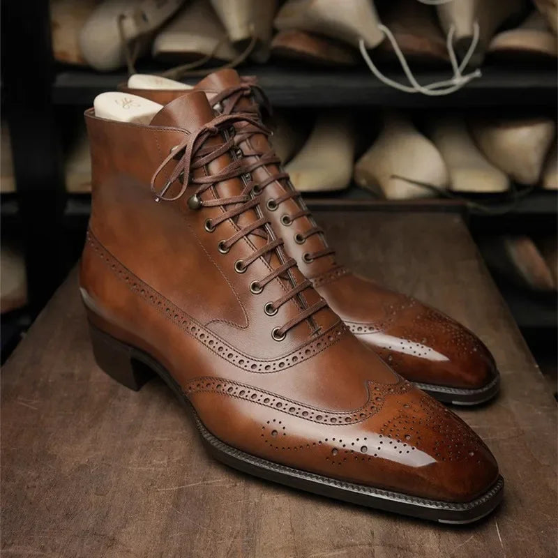 Men's ankle brogue boots with lace-up fronts, perforated detailing and low heels