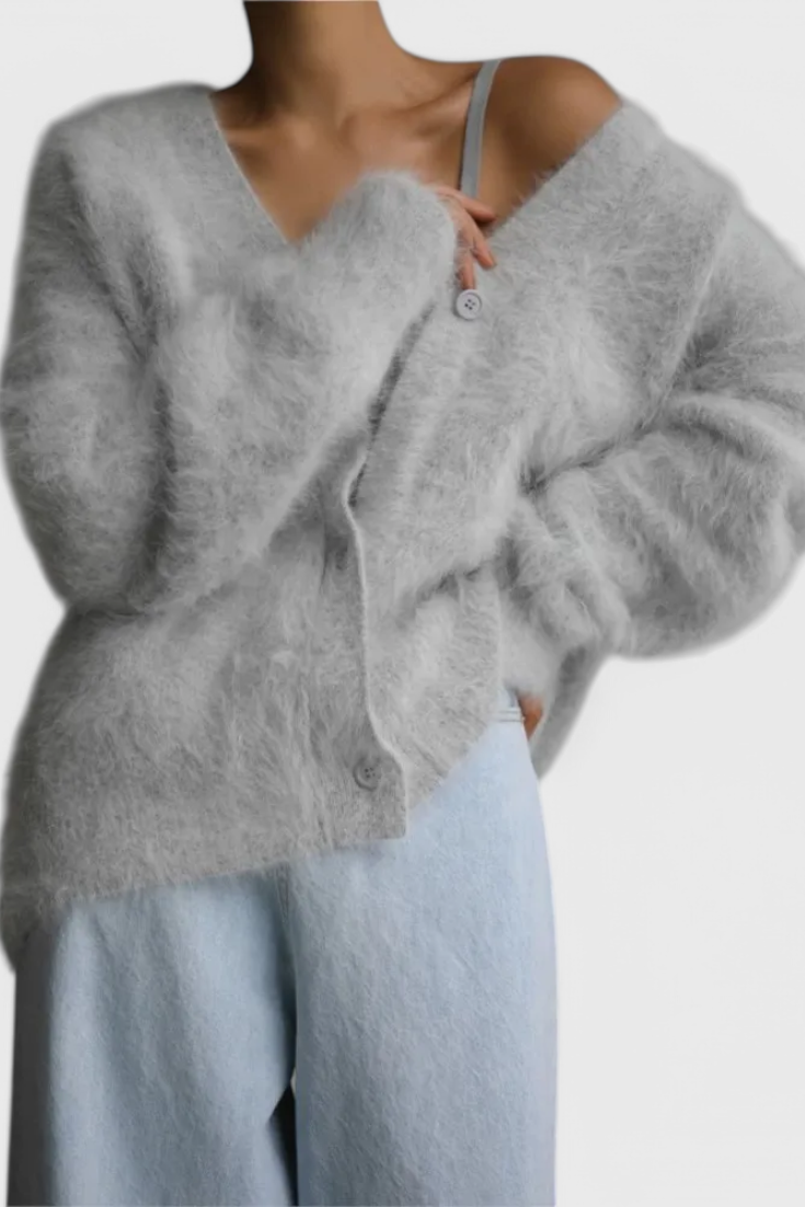 Women's relaxed V-neck button-front cardigan with long sleeves and ribbed trims