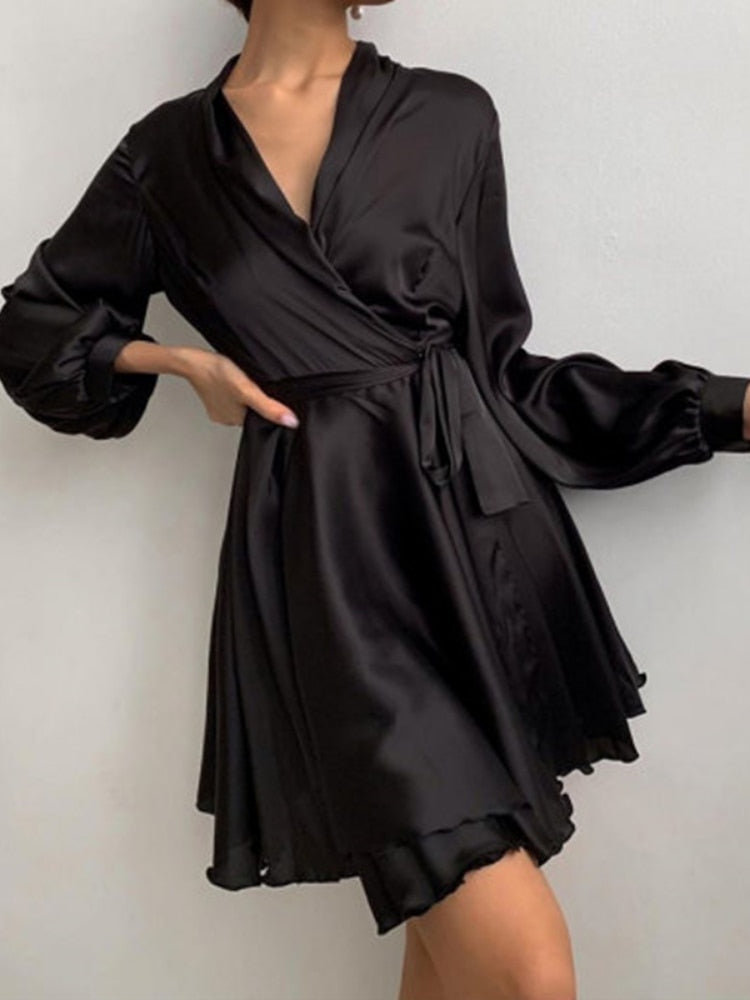 Women's long-sleeved wrap mini dress with a tie waist and flared skirt