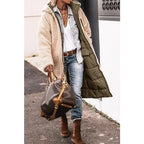 Women's long quilted hooded coat with contrasting textured trim and side pockets