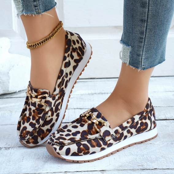 Women's leopard print loafers with chain trim and flat soles