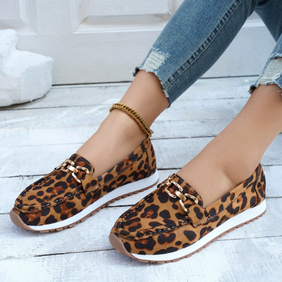 Women's leopard print loafers with chain trim and flat soles