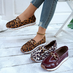 Women's leopard print loafers with chain trim and flat soles