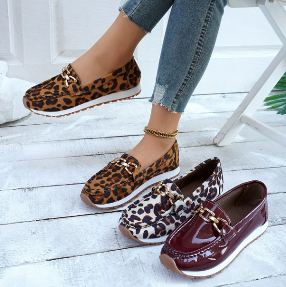 Women's leopard print loafers with chain trim and flat soles